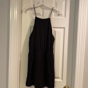 Urban outfitters black romper with pockets.